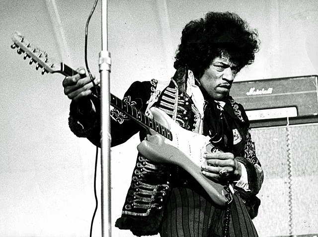 Jimi on guitar